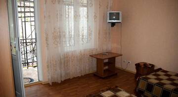 Фото номера Стандартный двухместный номер с 1 кроватью или 2 отдельными кроватями Гостевой дом Мини-отель «Невский» г. Архипо-Осиповка 2