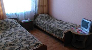 Фото номера Стандартный четырехместный номер Гостевой дом Мини-отель «Невский» г. Архипо-Осиповка 5