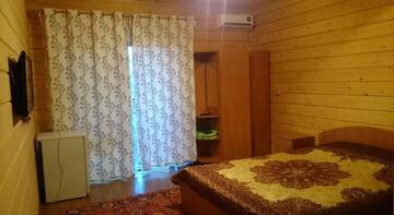 Фото номера Большой двухместный номер c 1 кроватью или 2 отдельными кроватями Гостевой дом Mama Djan г. Архипо-Осиповка 4