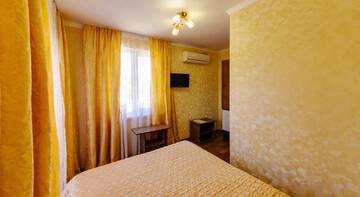 Фото номера Номер  Гостевой дом Tikhoe Mesto г. Архипо-Осиповка 16
