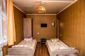 Фото номера Четырехместный номер Гостевой дом Вишневая 28а г. Архипо-Осиповка 4